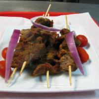 1 Suya Stick (Beef Stick Meat) pieces in a stick. · Beef Suya pieces in a stick.