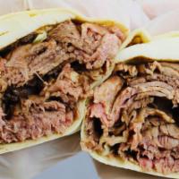 14. Peter Luger Roast Beef Wrap · Homemade roast beef, melted mozzarella, and Peter Luger sauce.
