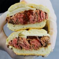 14. Peter Luger Roast Beef Roll · Homemade roast beef, melted mozzarella, and Peter Luger sauce.
