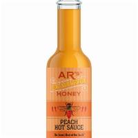 AR's Hot Southern Honey Peach Hot Sauce default · Little-known fact: Before peaches became synonymous with the Deep South—and attained officia...
