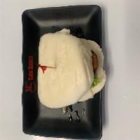 A2. Kakuni Bun · 1 piece. Steamed bun stuffed with pork chashu, lettuce and chef special sauce.