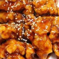 S11. Sesame Chicken · Served with white rice.