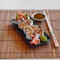 3. Tiger Roll · Shrimp tempura, avocado and cucumber topped with ebi, shrimp, light spicy mayo and teriyaki ...