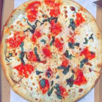 Margarita pizza pie · Fresh Mozzarella, Tomato Sauce and fresh basil 
