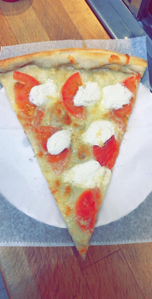 White Pizza with Tomato Slice. · Mozzarella, Parmesan cheese, ricotta cheese, fresh garlic and fresh tomatoes.