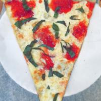 Margarita Pizza Slice. · Fresh mozzarella, homemade tomato sauce and fresh basil.