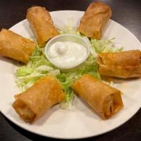 Buffalo Chicken Spring Rolls Family Size · A family size portion of 3 orders of our Buffalo Chicken Spring Rolls stuffed with buffalo c...