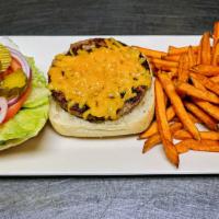 Impossible Burger (Vegan) · A delicious plant-based burger, lettuce, tomato, dairy-free cheddar cheese, pickles and red ...