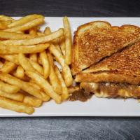 French Onion Grilled Cheese · French onion soup meets grilled cheese sandwich with this Gruyère smothered carmelized onion...