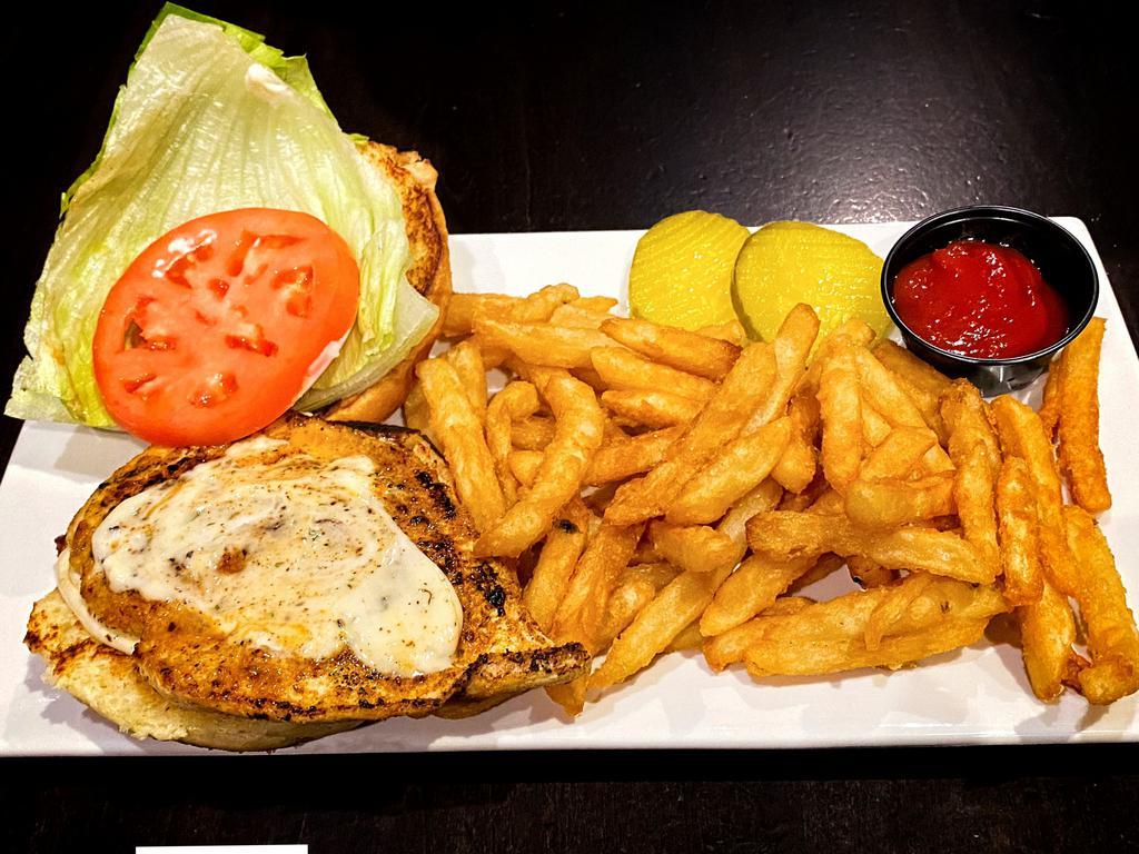 Cajun Chicken Sandwich · Cajun-spiced chicken breast served with crispy lettuce, tomato, and ranch mayo served on a toasted brioche bun.