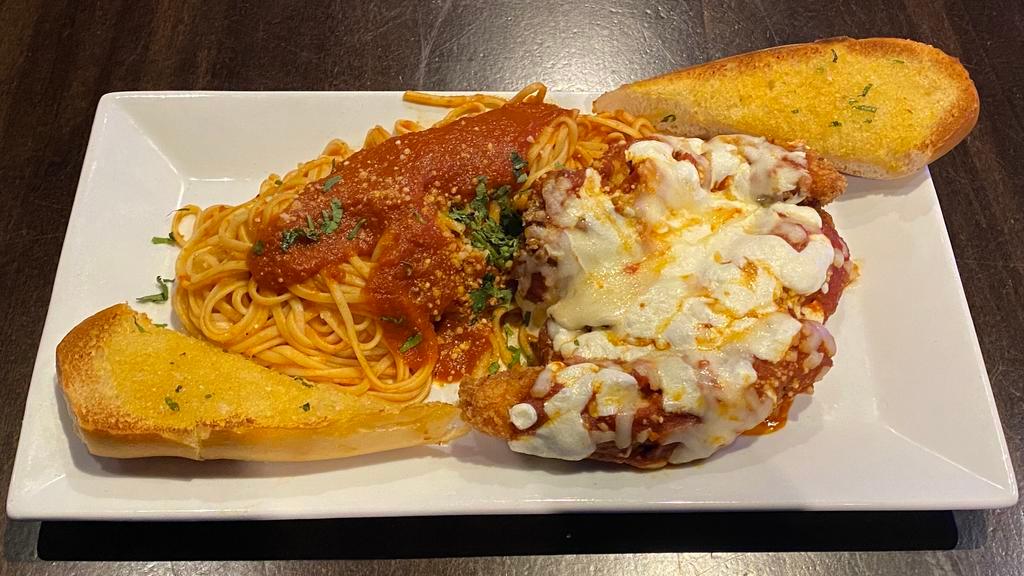 Chicken Parm Over Linguini Half Tray · This half tray is 5 servings of our boneless chicken breast coated in our signature panko mix covered in marinara sauce, mozzarella and parmesan cheeses and served with toasted garlic bread.