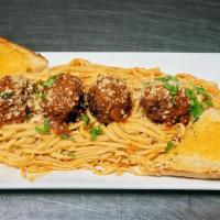 Linguini with Meatballs · Meatballs covered in marinara sauce and and parmesan cheese over a bed of linguini and serve...