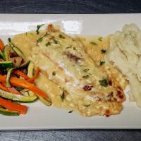 Chicken Caprese · Boneless chicken filet sautéed and topped with red peppers and melted mozzarella cheese. Ser...