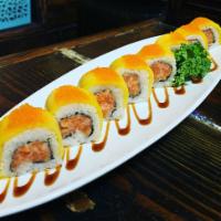 Cantinflas roll · spicy crunch salmon inside whit mango and masago in the top