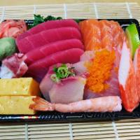 Sashimi Deluxe Combo · 10 pieces of assorted sushi. Served with miso soup or white rice.