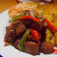 Fried Pork (Griot) ·  Pork shoulder marinated in house spices for 48-hours, chopped up in small bite sized cubes ...