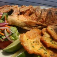 Whole Red Snapper  · Whole red snapper deep fried then topped with onions and peppers! This is made to order, Ple...