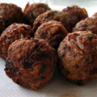 Cajun Meatballs (Boulette) · Ground beef mixed with herbs and spices formed into 6 generous sized meatballs then deep fri...