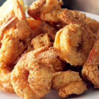 Shrimp with Fries · 8 large shrimp marinated in house spices then fried to golden brown perfection! 