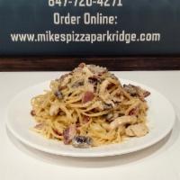 Sunday- Linguini Mascarpone · Linguini pasta with a mascarpone cream sauce topped with chicken, sun-dried tomatoes, bacon,...