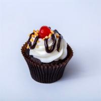 Hot Fudge Sundae · 6 or 12 chocolate cupcakes with our signature buttercream frosting, roasted peanuts, hot fud...