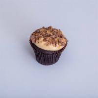 Peanut Butter Cup · 6 or 12 Chocolate cupcakes, peanut butter cream cheese frosting, topped with crumbled Reese'...