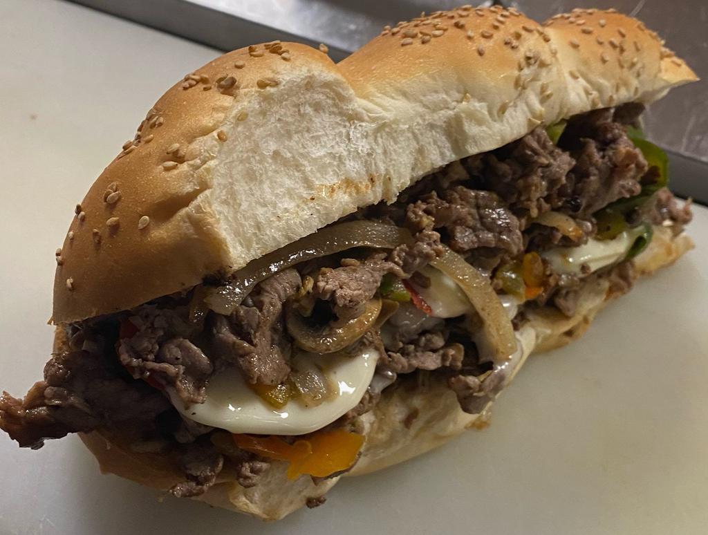 Steak and Cheese Sub  · Lincoln’s classic shaved steak, griddled with melted American cheese on a braided sesame roll.