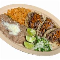 Taco Plate · 3 Tacos (1 choice of meat), Rice and Beans