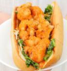 Vegan Po Boy · Seasoned, dipped, and fried vegan cauliflower tossed in buffalo sauced served in a toasted b...