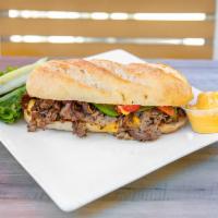 Chef Jose's Philly Cheese Steak Lunch  · Thinly sliced steak sandwich with grilled onions and peppers on a French baguette finished w...