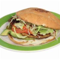 Torta · Sliced bread filled with ham and your choice of meat, cheese,
lettuce, avocado, jalapeno, to...