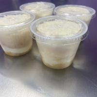 4 Pack Pineapple Cake Cups · (4) 5.5 oz cups with pineapple on the bottom, layered with pineapple cake and pineapple crea...
