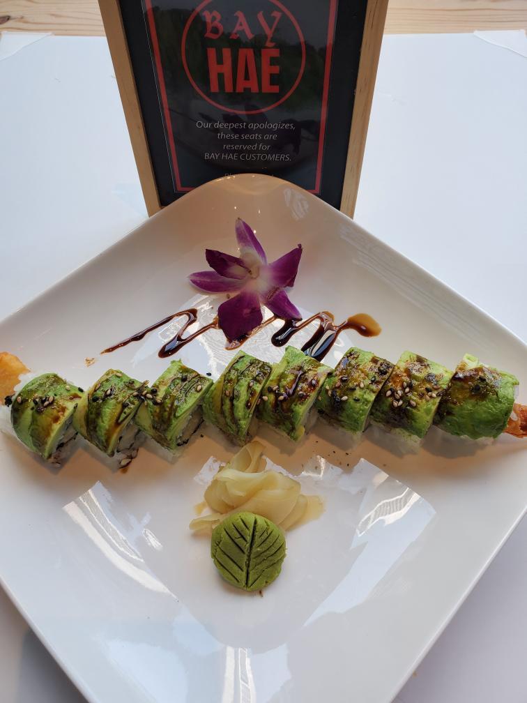 Green Dragon Roll · Shrimp tempura, sushi rice, top avocado, sesame seeds & eel sauce.