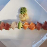 Rainbow Roll · Crab meat, avocado, nori, sushi rice & top chef choice fish.