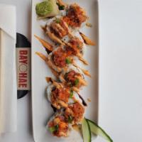 Dynamite Roll · Crab meat, avocado sushi rice, top spicy tuna, sesame seeds & spicy mayo.