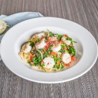 Shrimp Scampi with Linguine  · Garlic, white wine, butter, lemon juice, tomatoes, spinach and parsley.