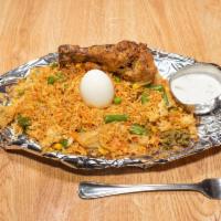 Veg Biryani · Rich and exotic dish cooked with mixed vegetables, spices, and saffron flavored basmati rice...