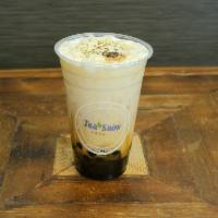 38. Golden Bubble Milk · Brown sugar boba with fresh milk layered with sea salt cream and topped with caramelized bro...
