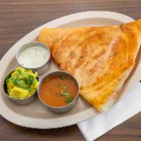 20. Mysore Masala Dosai · Thin rice crepes filled with layer of hot chutney, filled with potatoes and onions.
