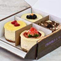 Cheesecake Sampler Box · The Cheesecake Sampler includes four personal size (3″) cheesecakes. Cheesecake flavors incl...