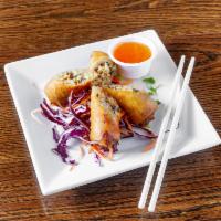 Egg Rolls · Stuffed with shredded cabbage, carrot, vermicelli noodles and pork.