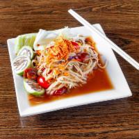 Papaya Salad · House-made fermented anchovy fish sauce with shredded green papaya and cherry tomatoes. Come...