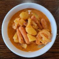 Mussamun Curry · Massaman curry is a rich, relatively mild Thai curry. Has coconut milk, peanuts, onions and ...