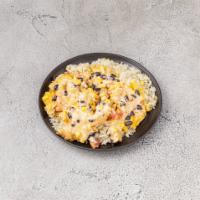 Baja Bowl · chicken, cheddar, black bean & corn salsa, & creamy chipotle over seasoned rice or lettuce