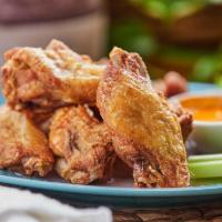 10 Pc. Lady Wings · Our signature chicken wings smoked then finished off in the deep fryer. Served with choice o...