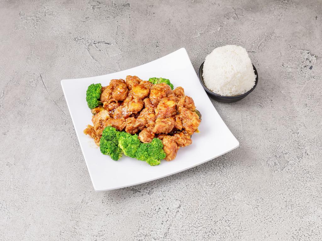 S3. General Tso's Chicken · Deep fried chunk of chicken in hot pepper, garlic flavored tangy brown sauce served in broccoli. Hot and spicy.