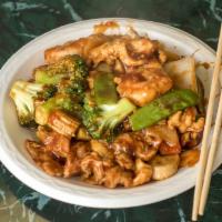 S18. Triple Szechuan Style · Shrimp, beef and chicken with mixed vegetables in szechuan style. Hot and spicy.