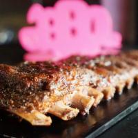 Rockin' Ribs · Big Mama’s specialty, these ribs have both the bark and the bite. Award-winning premium St. ...