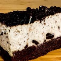 Oreo Mousse Cake · Oreo Cheesecake sitting on a fudgy brownie crust and topped with a layer of Oreos