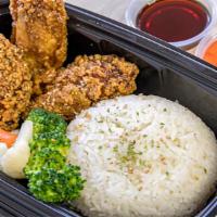 Fried Chicken Wings over Rice · 3 fried chicken wings served with rice and mixed vegetables 